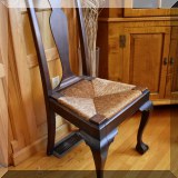 F09. Rush seat chair with claw and ball feet.